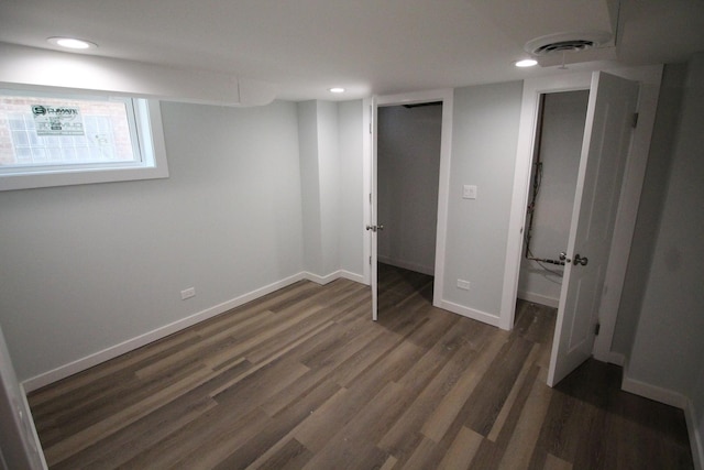 interior space featuring sink and dark hardwood / wood-style floors