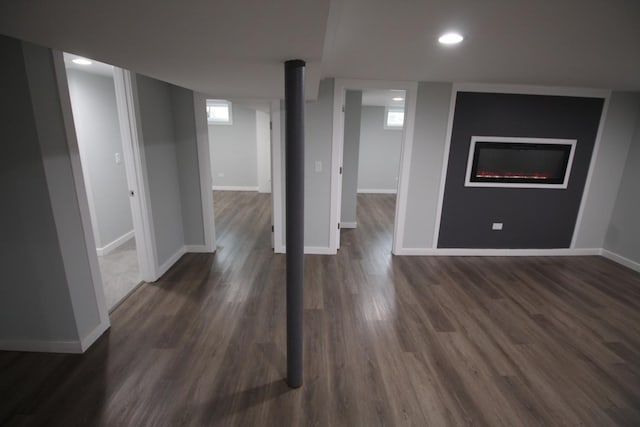 basement featuring dark wood-type flooring