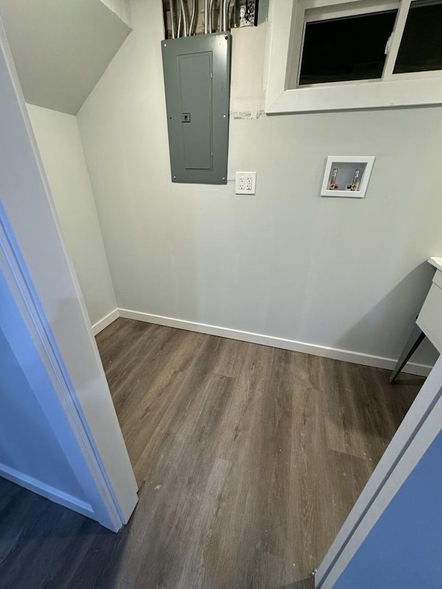 laundry area with electric panel, hookup for a washing machine, and dark wood-type flooring