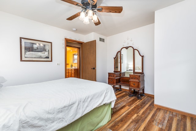 bedroom featuring ceiling fan and dark wood-type flooring