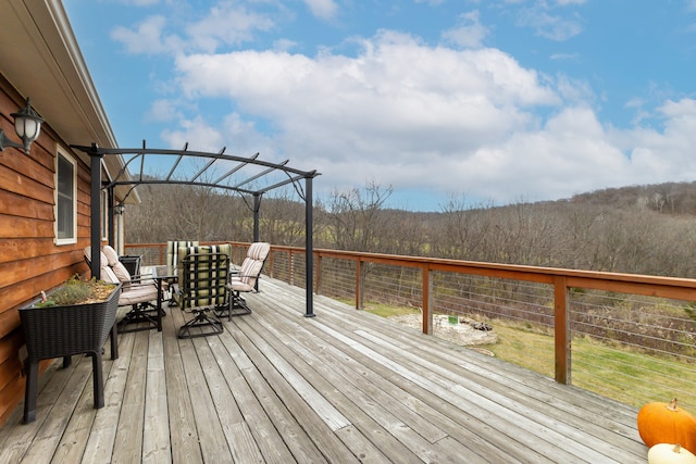 wooden terrace with a pergola