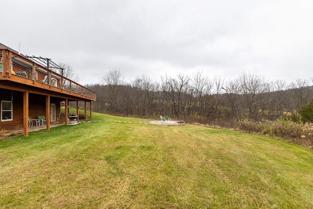 view of yard with a wooden deck