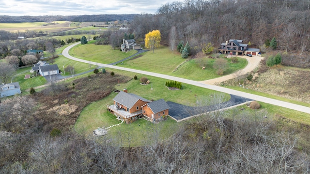 birds eye view of property featuring a rural view