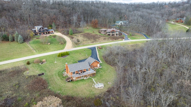 birds eye view of property with a rural view