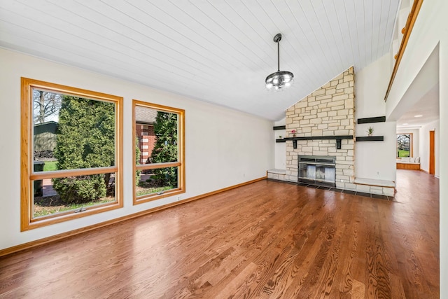 unfurnished living room with wood-type flooring, high vaulted ceiling, wooden ceiling, a notable chandelier, and a fireplace