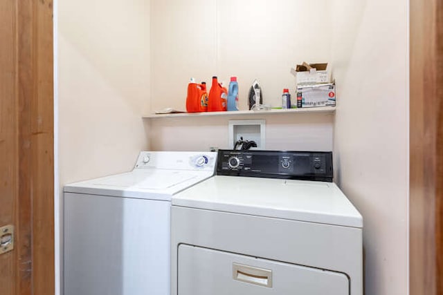 laundry room with independent washer and dryer