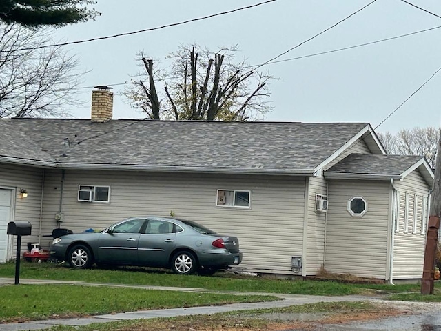 view of property exterior featuring a yard