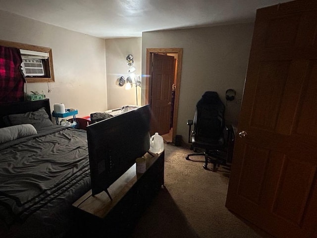 bedroom with carpet and an AC wall unit