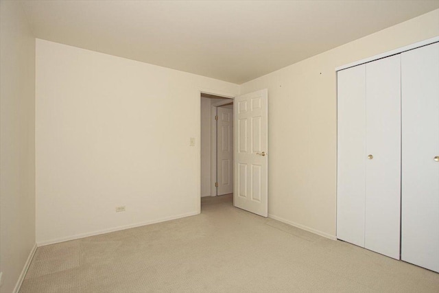 unfurnished bedroom featuring a closet