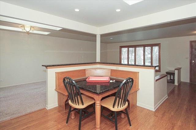 dining room with light hardwood / wood-style floors