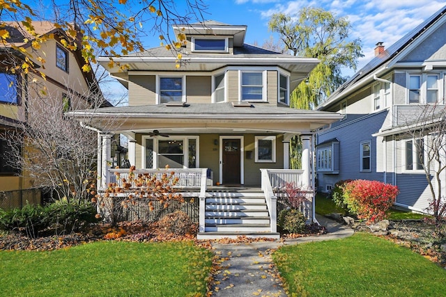 view of front facade featuring a porch and a front lawn