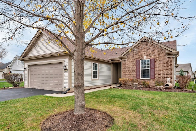 ranch-style house with a front lawn and a garage