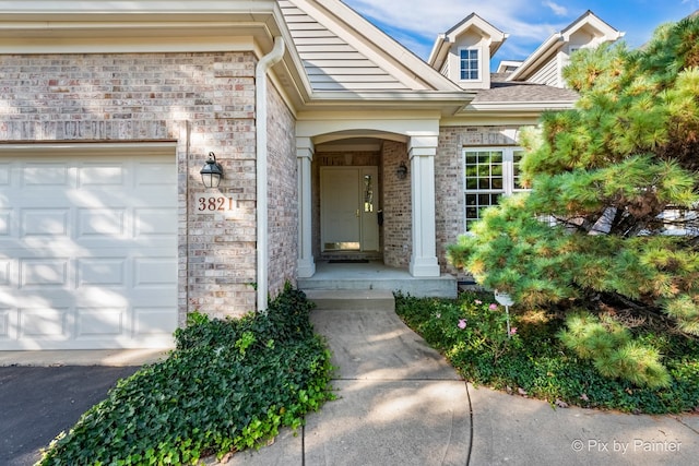 entrance to property featuring a garage