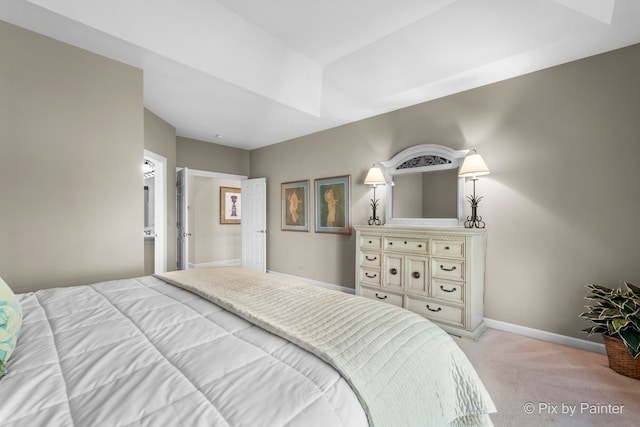 bedroom with light colored carpet