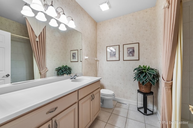 bathroom with tile patterned flooring, vanity, a notable chandelier, walk in shower, and toilet