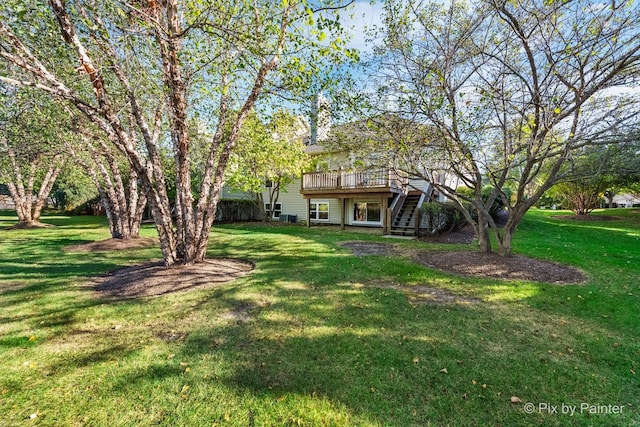 view of yard featuring a deck