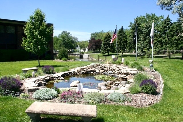 view of home's community featuring a yard