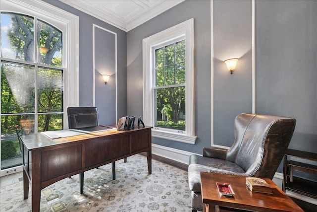 office space with crown molding and light hardwood / wood-style floors