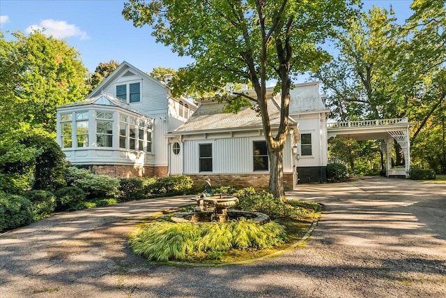 view of front of house featuring a carport