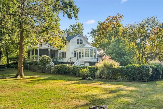 exterior space featuring a sunroom