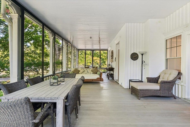 sunroom featuring a healthy amount of sunlight