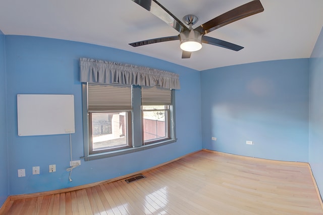 unfurnished room featuring ceiling fan and light hardwood / wood-style flooring