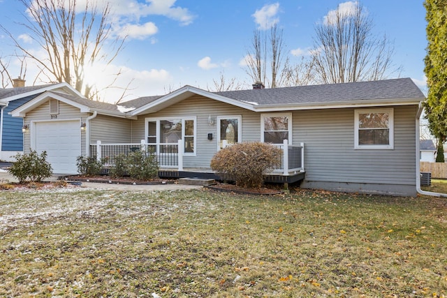 ranch-style house featuring central AC unit, a porch, a garage, and a front lawn