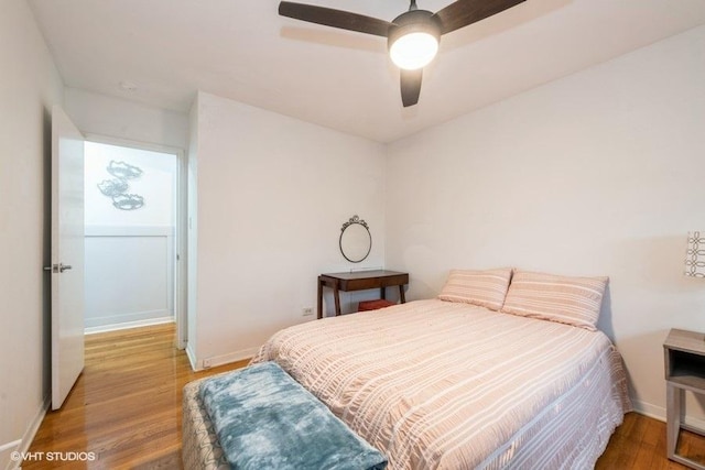 415 S Maple Ave Unit 202, Oak Park, IL 60302 - bedroom with light wood-style flooring, baseboards, and a ceiling fan