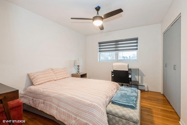 415 S Maple Ave Unit 202, Oak Park, IL 60302 - bedroom with wood finished floors and a ceiling fan