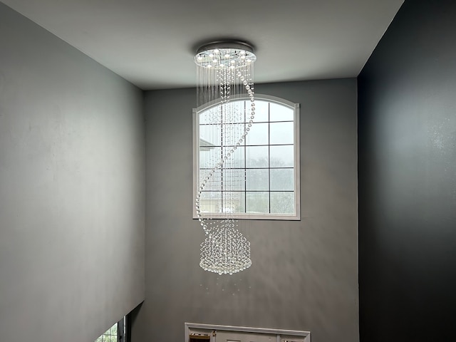 details featuring an inviting chandelier