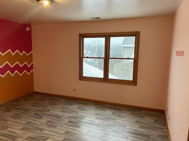 18502 River Rd, Hazel Crest, IL 60429 - empty room with wood finished floors and baseboards