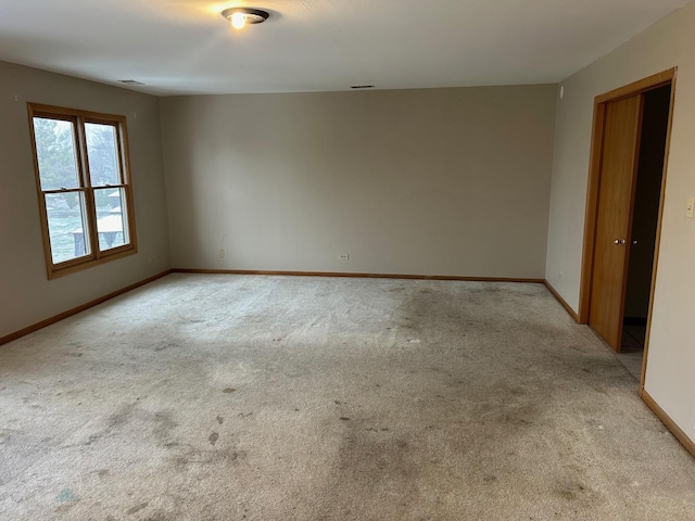 18502 River Rd, Hazel Crest, IL 60429 - unfurnished room with light carpet and baseboards
