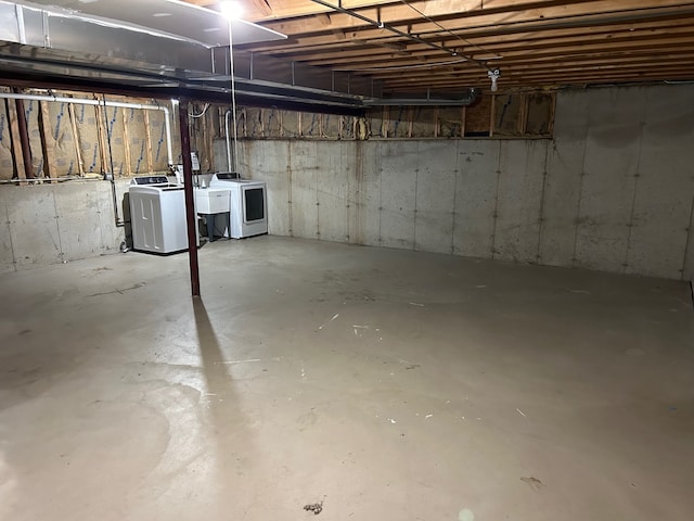 basement with washing machine and dryer