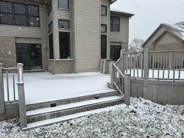 view of snow covered deck