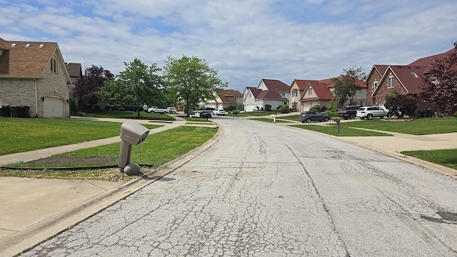 18502 River Rd, Hazel Crest, IL 60429 - view of asphalt road featuring a residential view and curbs