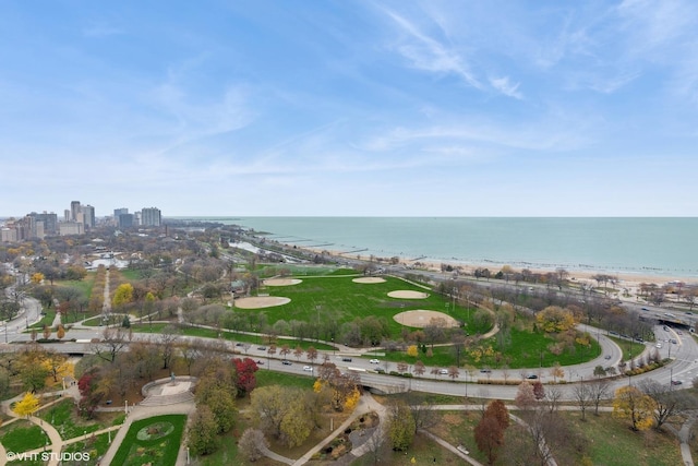 birds eye view of property with a water view