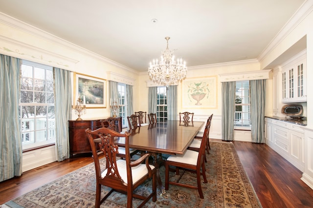 dining space featuring a wealth of natural light, crown molding, and dark hardwood / wood-style floors