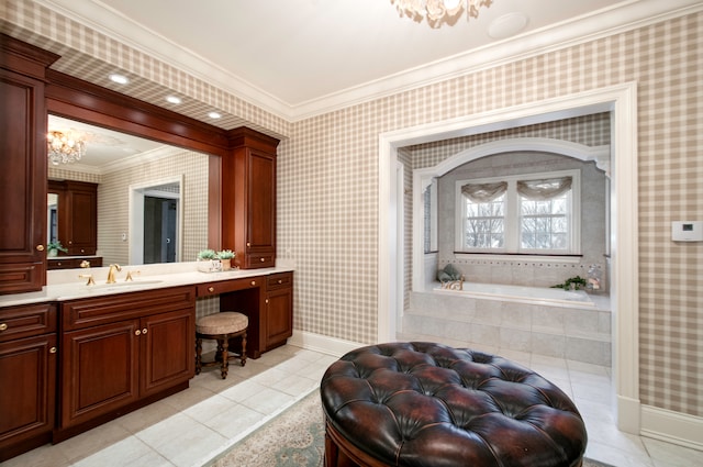 bathroom featuring tile patterned floors, tiled tub, crown molding, and vanity