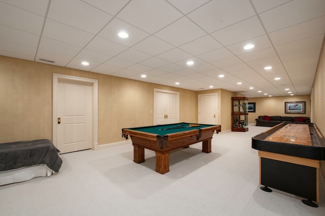 game room with light colored carpet, a drop ceiling, and pool table