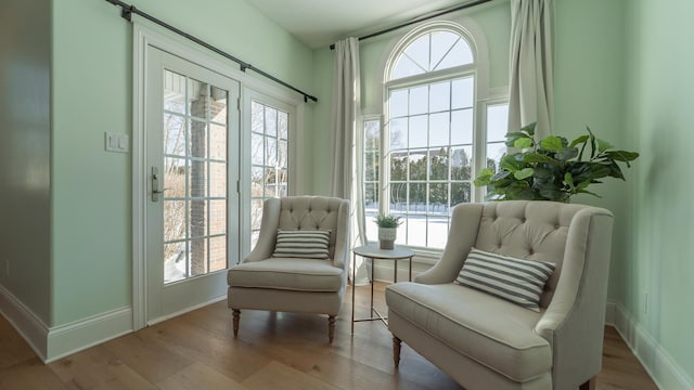 sitting room featuring light hardwood / wood-style floors