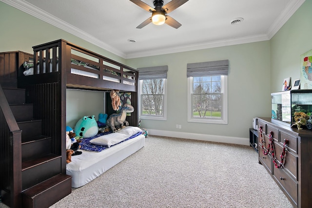 bedroom featuring crown molding, ceiling fan, and carpet floors