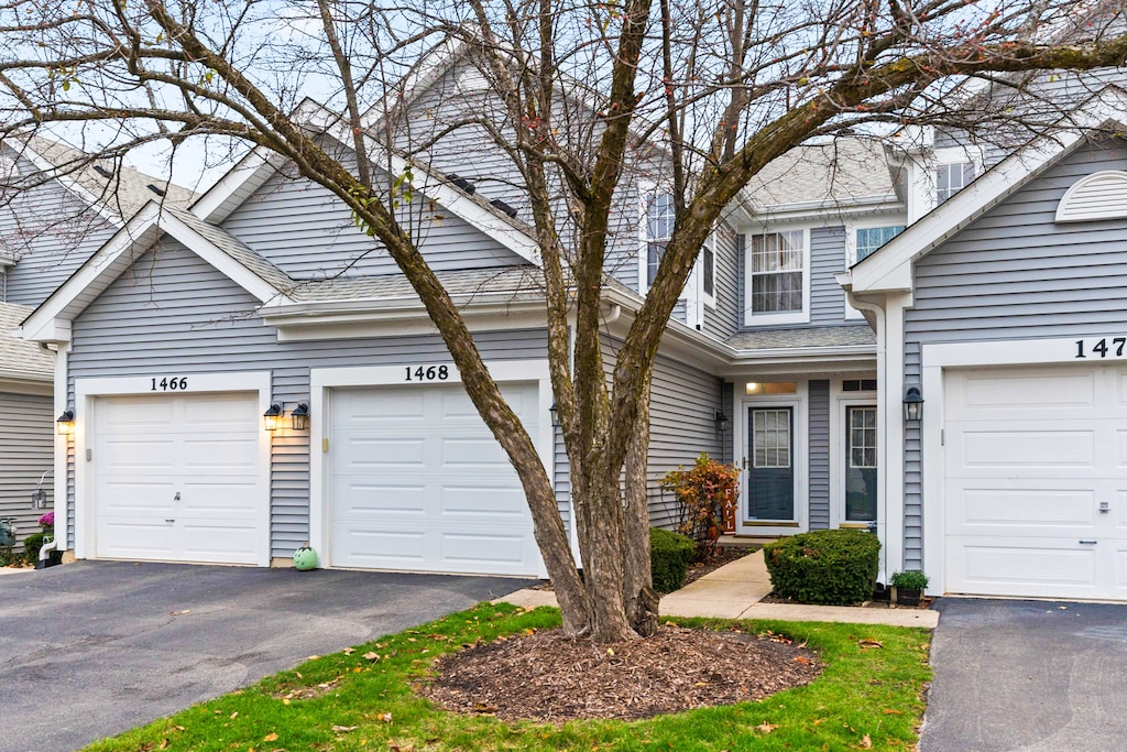 front of property featuring a garage