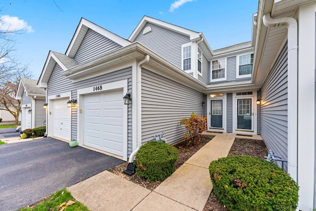 exterior space with a garage