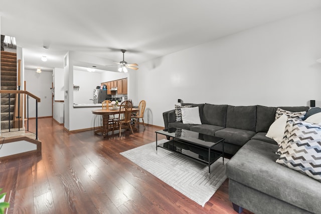 living room with hardwood / wood-style flooring and ceiling fan