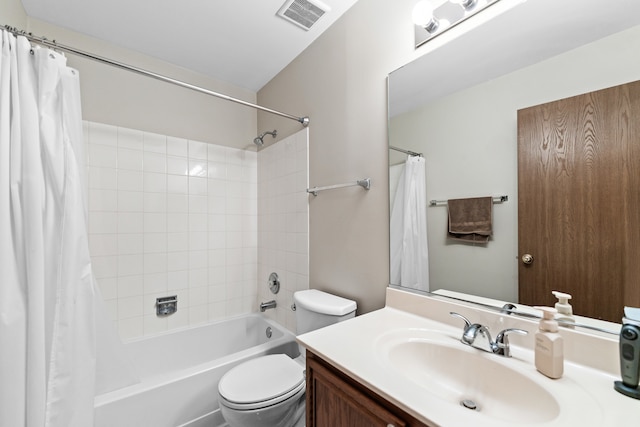 full bathroom featuring vanity, toilet, and shower / bath combo with shower curtain