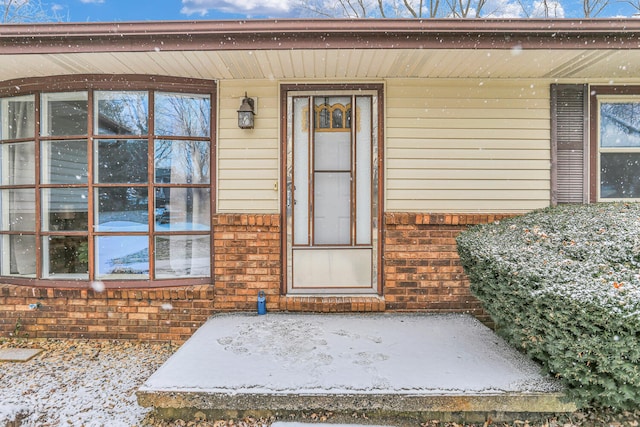 doorway to property featuring a porch