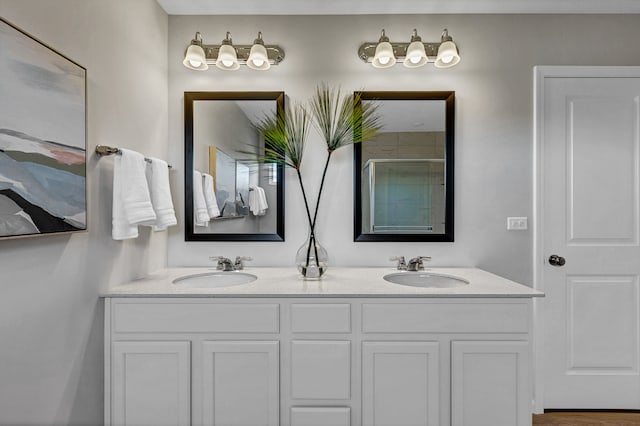 bathroom featuring hardwood / wood-style floors and vanity