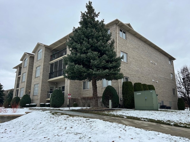 view of snow covered property