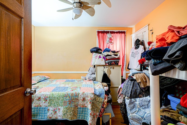 bedroom featuring ceiling fan and hardwood / wood-style floors