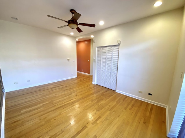 unfurnished bedroom with light wood-type flooring and ceiling fan